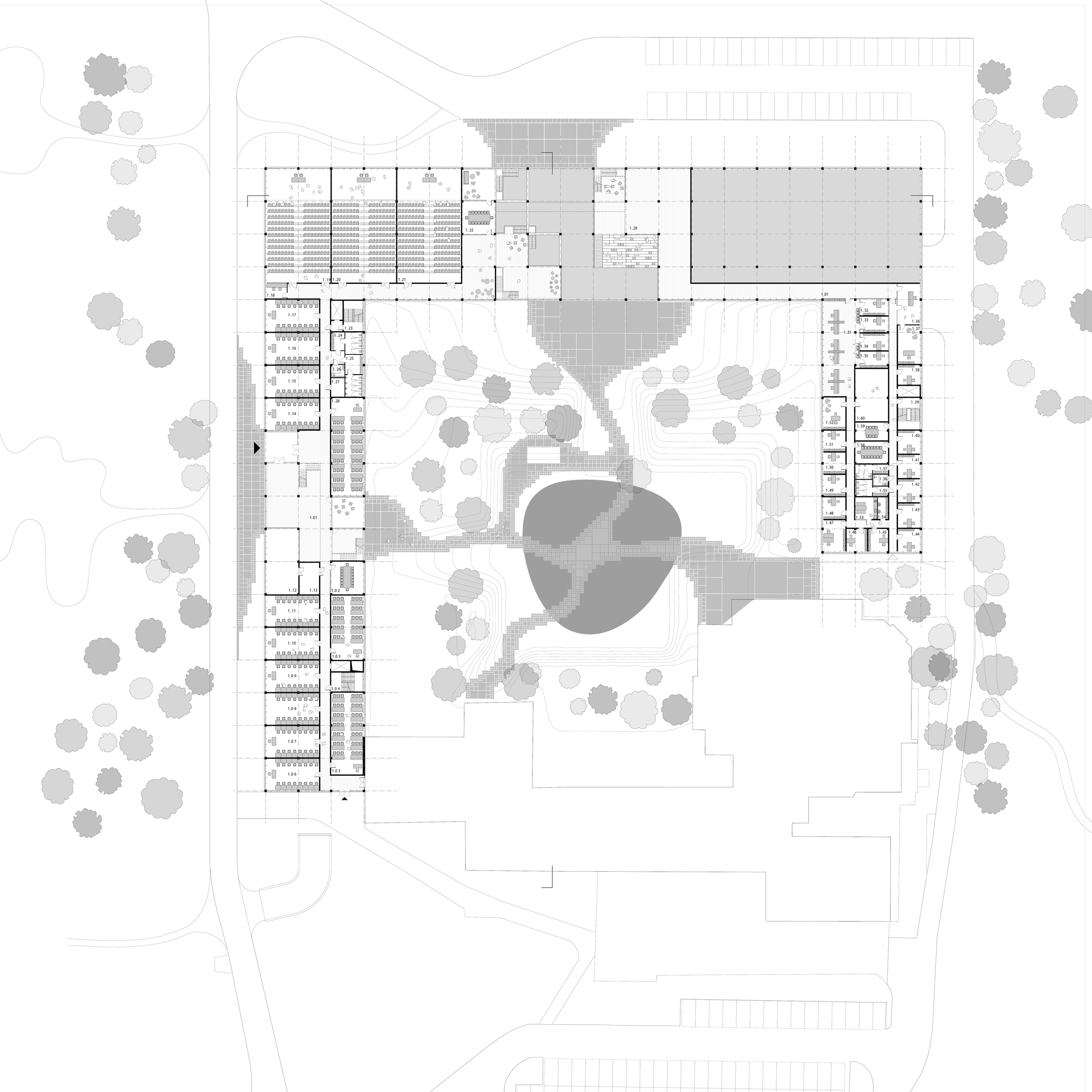Complete first-floor plan showing teaching rooms, lecture spaces and circulation around the courtyard