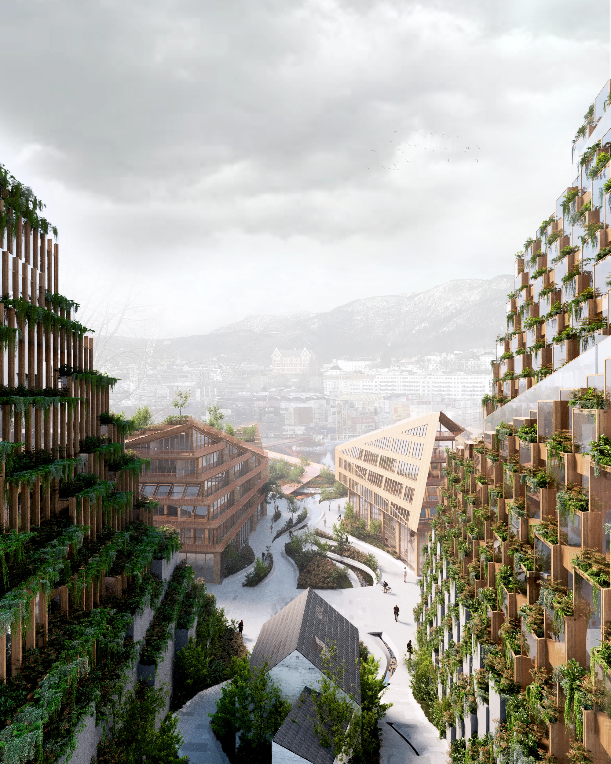 Terraced buildings framing a planted public route towards the fjord