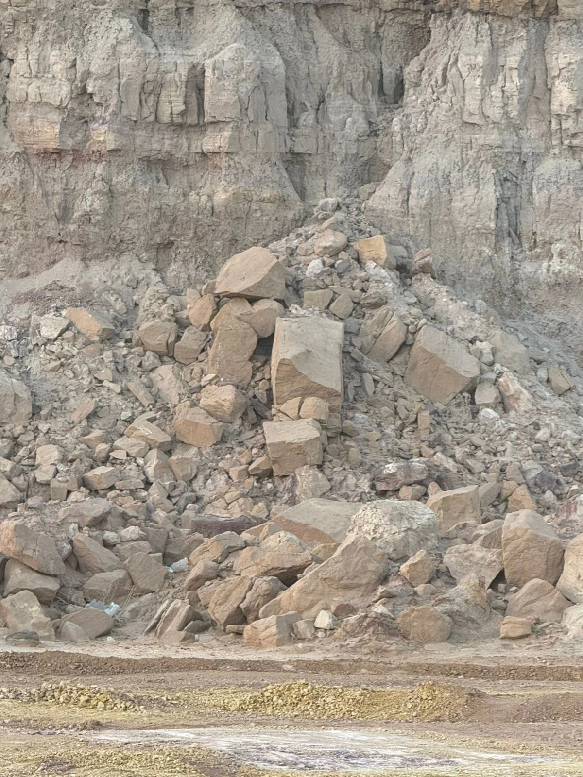 Angular rockfall at the foot of a layered cliff