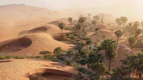 Low aerial view of Fai Resort’s earth-sheltered buildings and landscaped desert setting