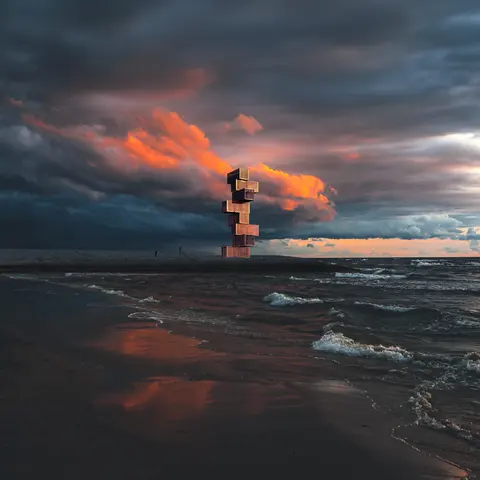Container Tower proposal beside the Westerschelde, beneath a dramatic orange and charcoal sky